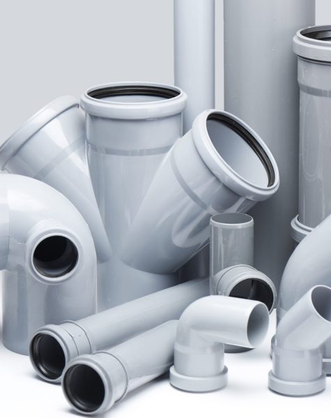 Plumbing, sewage. Gray polypropylene tubes on a white background in futuristic style